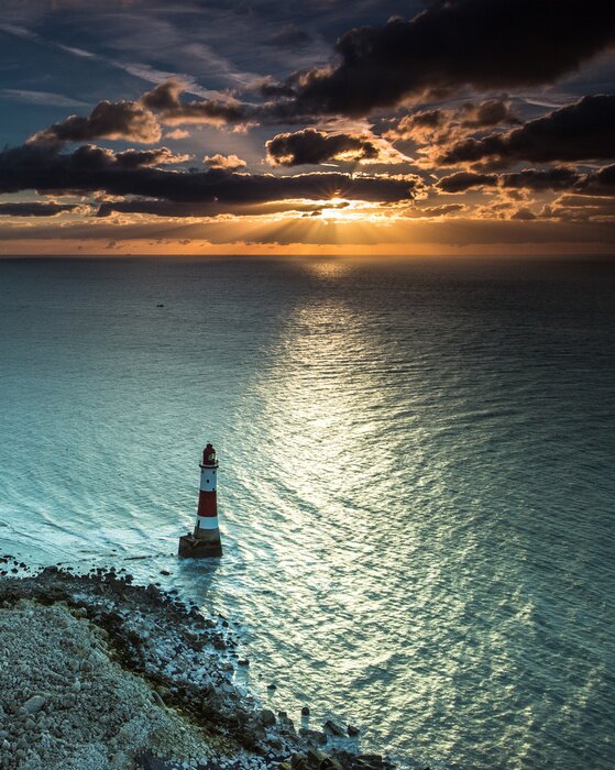 Fototapete Leuchtturm am türkisfarbenen Meer