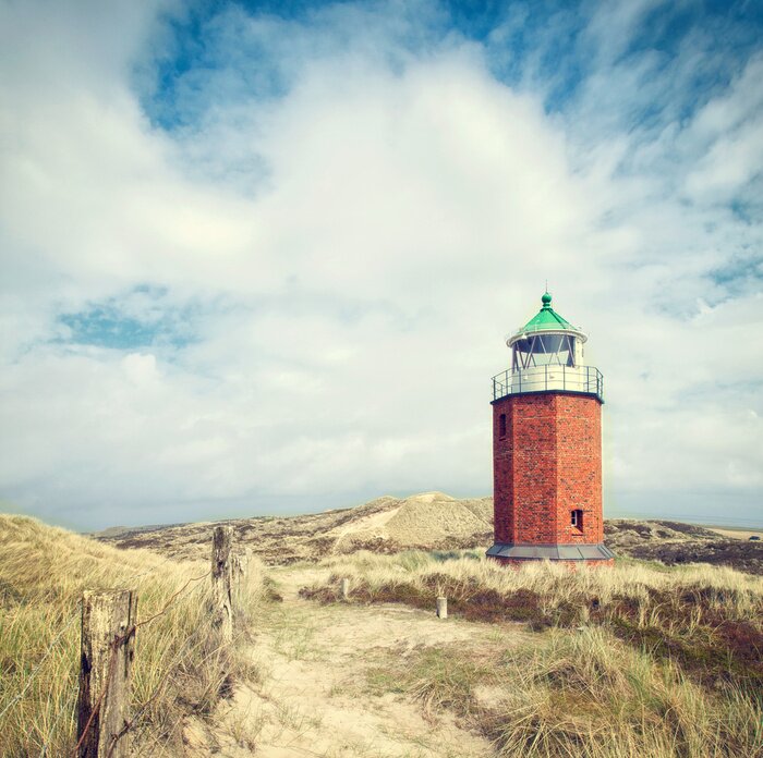 Fototapete Leuchtturm aus orangenfarbenenen Ziegeln
