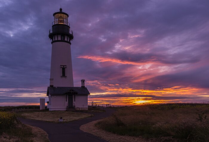 Fototapete Leuchtturm in der Abenddämmerung