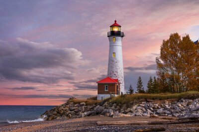 Fototapete Leuchtturm vor rosa Himmel