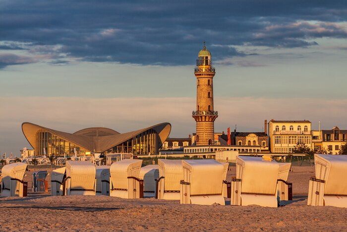 Fototapete Leuchtturm Warnemünde bei Sonnenuntergang