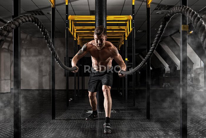 Fototapete Mann, der Seile wirft