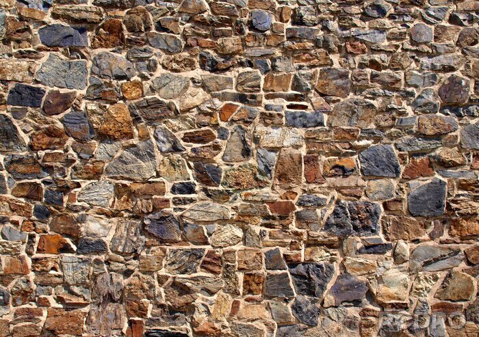 Fototapete Mauer aus bunten schönen Steinen