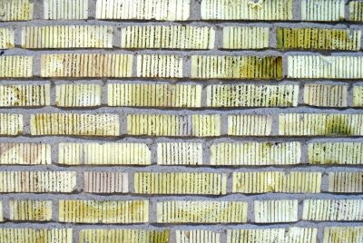 Fototapete Mauer aus grünen gestreiften Ziegeln