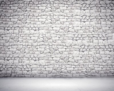 Mauer aus hellen unregelmäßigen Steinen