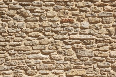 Fototapete Mauer aus natürlichen beigen Steinen