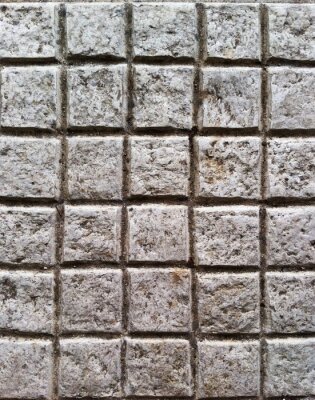 Fototapete Mauer aus quadratischen Steinen