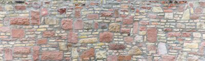 Fototapete Mauer aus vielfältigen Steinen
