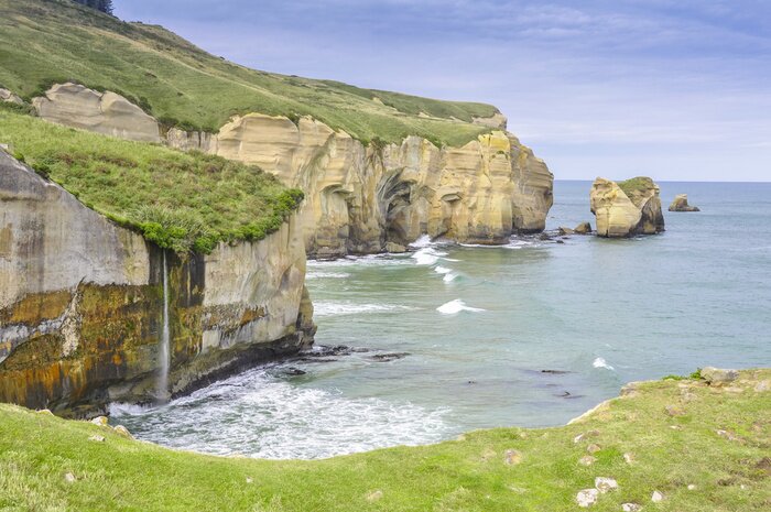 Fototapete Meer und grüne Landschaft