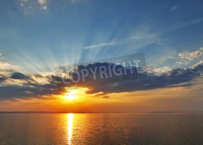 Fototapete Meeressonnenaufgang und Wolken
