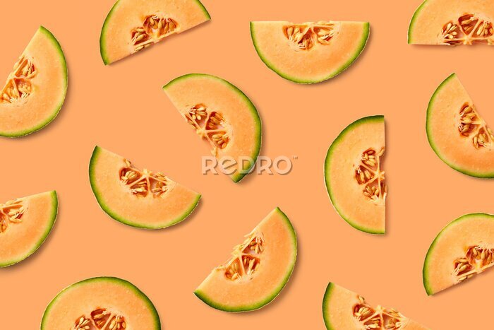 Fototapete Melone auf einem orangefarbenen Hintergrund