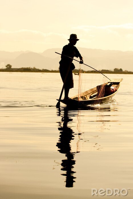 Fototapete Mensch in einem Boot auf einem See