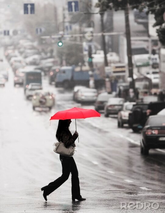 Fototapete Mensch mit rotem Regenschirm