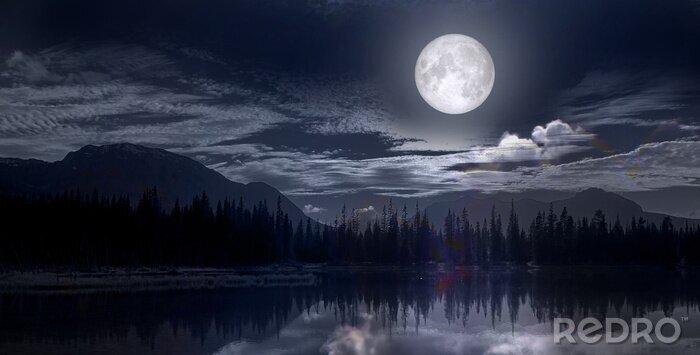 Fototapete Mondlicht über einem See in den Bergen