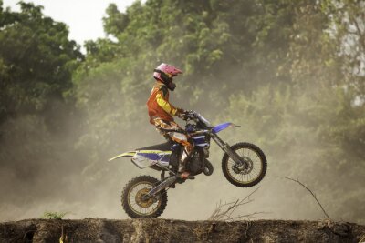Fototapete Motocross auf einem Hügel