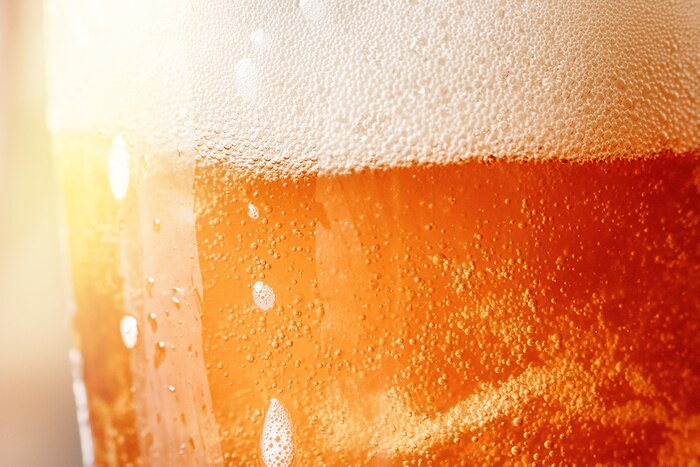 Fototapete Nahaufnahme von Bier im Glas