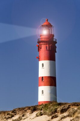 Fototapete Nahaufnahme von rot-weißem Leuchtturm
