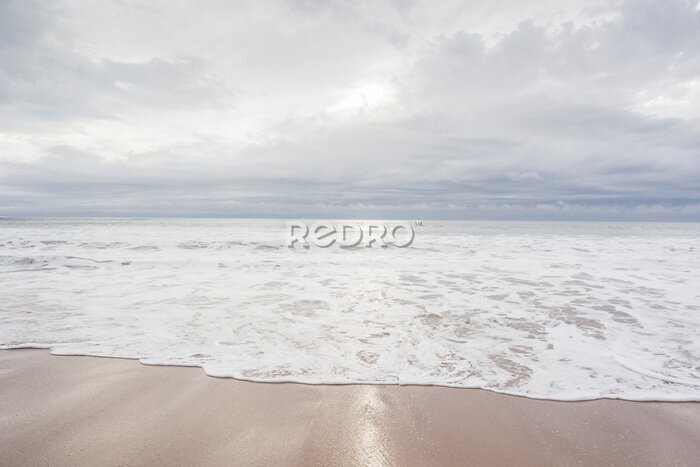 Fototapete Ocean, sea, sand beach with black clouds on horizon. Zen picture (France-Vendée-Les Sables-d'Olonne)