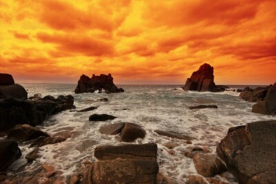 Fototapete Orangefarbener Himmel am Meer