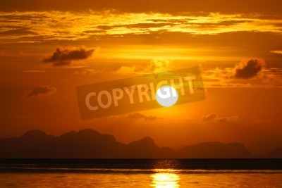 Fototapete Orangefarbener Himmel bei Sonnenuntergang