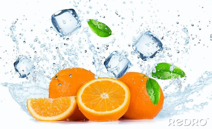 Fototapete Orangen mit Blättern und Eis