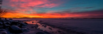 Fototapete Panorama eines farbenfrohen Sonnenuntergangs