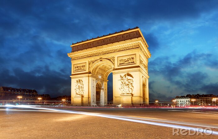 Fototapete Paris bei Nacht und beleuchteter Arc de Triomphe