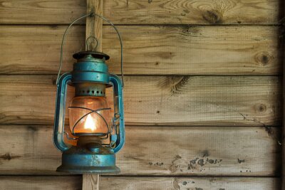 Fototapete Patroleumlampe auf Holz