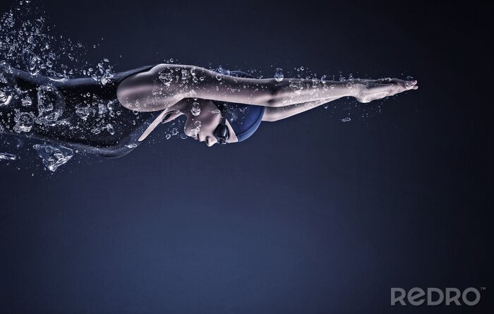 Fototapete Propfessionelle Schwimmerin im Wasser