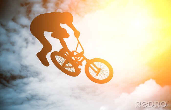 Fototapete Radfahrer bei Sonnenuntergang
