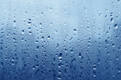 Fototapete Regenwetter von hinter dem Fenster gesehen