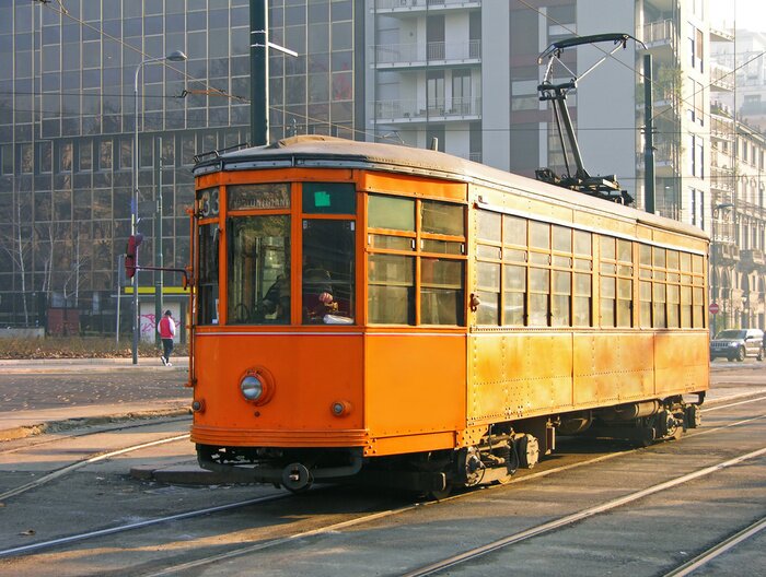 Fototapete Retro orangefarbene Straßenbahn