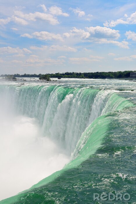 Fototapete Riesiger Wasserfall mit türkisfarbenem Wasser