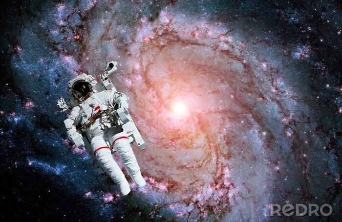 Fototapete Rosa Galaxie mit Astronauten