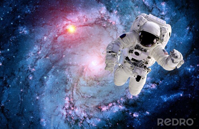 Fototapete Rosa Galaxie mit Kosmonauten