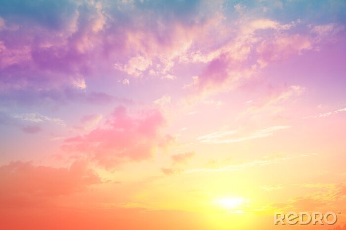 Fototapete Rosa Wolken beleuchtet durch den Sonnenuntergang