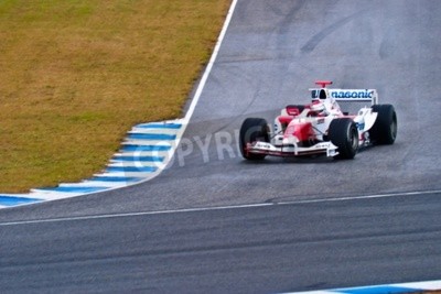 Fototapete Roter Bolid der Formel 1 auf der Rennstrecke