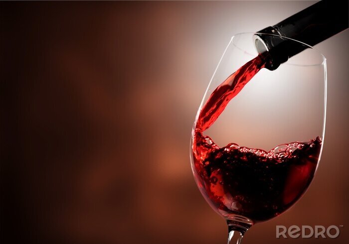 Fototapete Rotwein in Glas eingießen