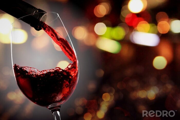Fototapete Rotweinflasche und Weingläser