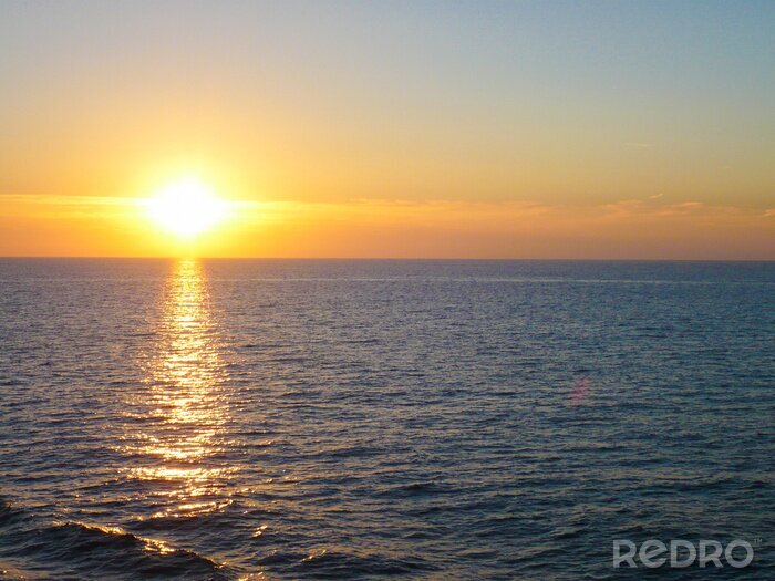 Fototapete Ruhiges Meer und Sonnenuntergang