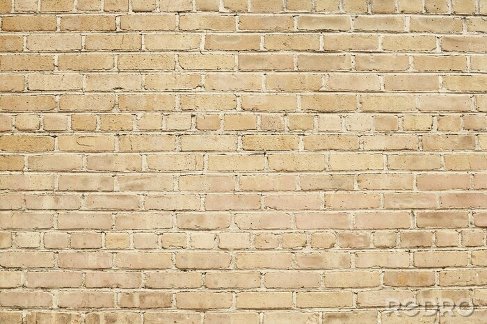 Fototapete Rustikale beige Backsteinmauer