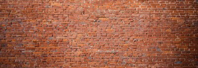Fototapete Rustikale orange Backsteinmauer