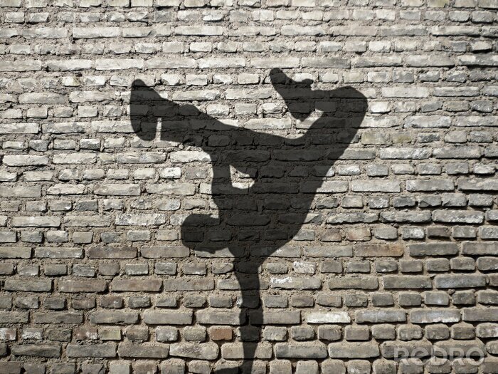 Fototapete Schaten vom Breakdance-Tänzer auf Mauer