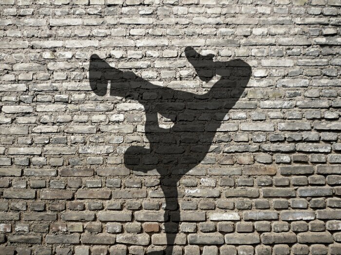 Fototapete Schaten vom Breakdance-Tänzer auf Mauer