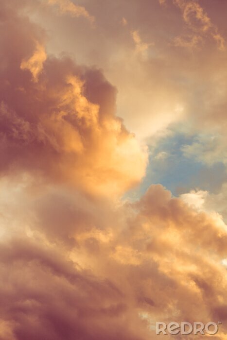 Fototapete Schatten der untergehenden Sonne und Wolken