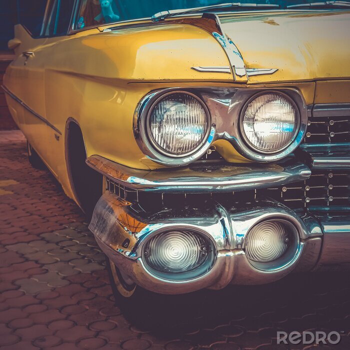 Fototapete Scheinwerfer des gelben Autos