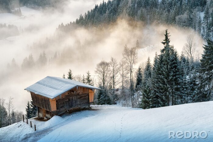 Fototapete Schneebedeckte hütte in den bergen