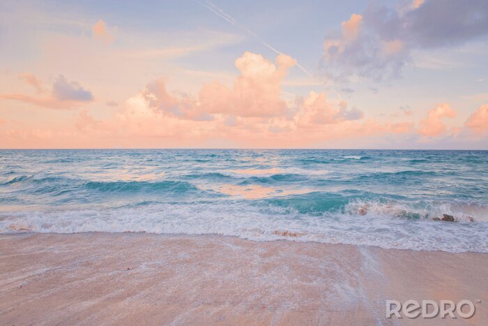 Fototapete Sea ocean beach sunset sunrise landscape outdoor. Water wave with white foam. Beautiful sunset airy red sky with clouds. Natural aquatic blue pink turquoise aquamarine colorful background.