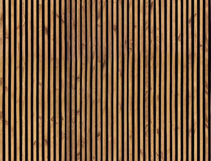 Fototapete Seamless pattern of modern wall paneling with vertical wooden slats for background. Raw material of natural brown wood lath.