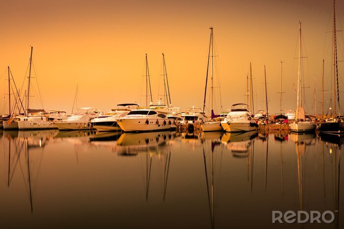 Fototapete Segelboote und gelber Abendhimmel